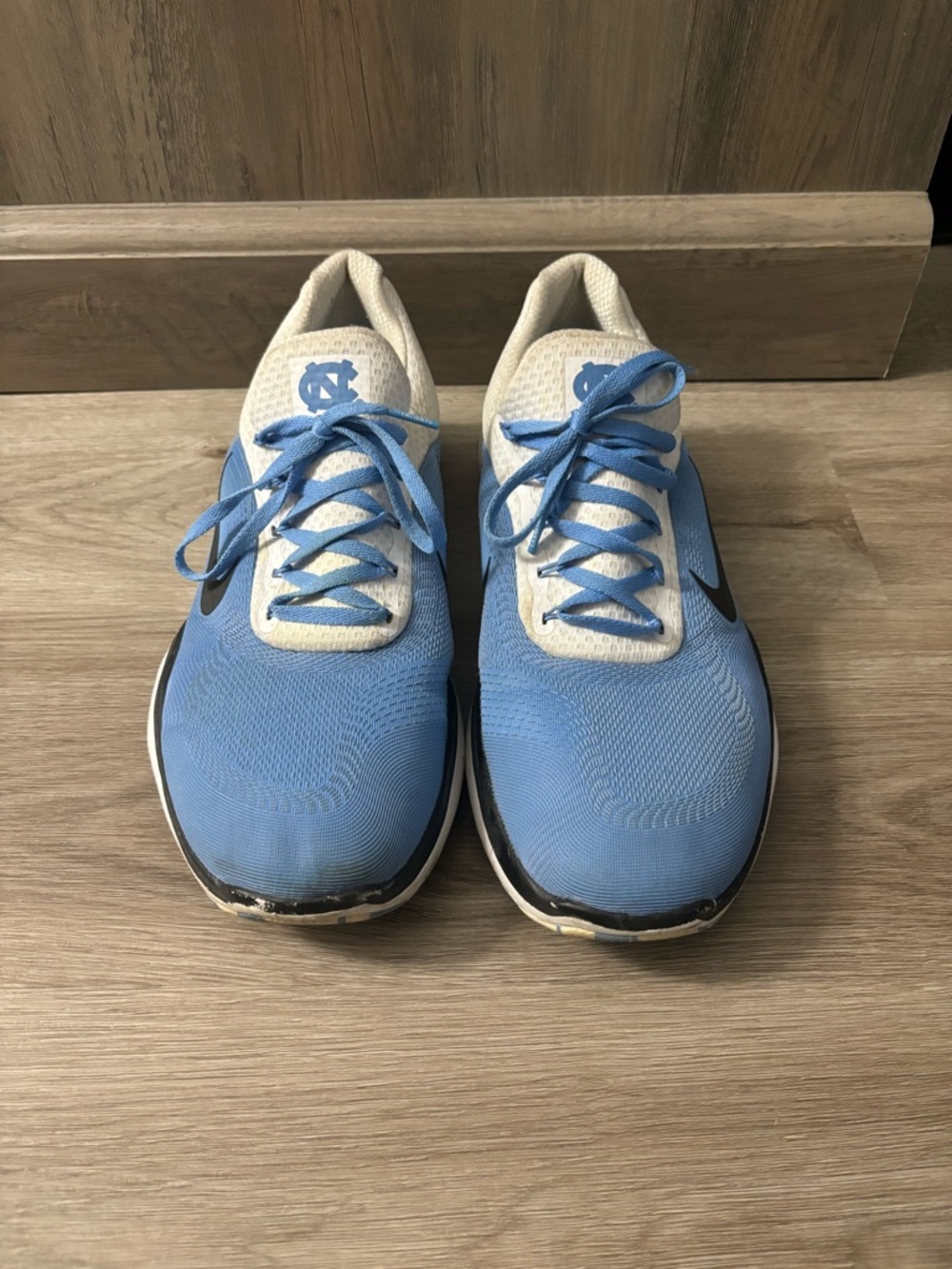 Nike Light Blue and White Running Sneakers with Black Swoosh